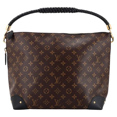 Louis Vuitton Triangle Softy Bag Reverse Monogram Canvas.